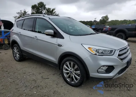 2017 Ford Escape Titanium z USA, uszkodzony, nr VIN 1FMCU9JD7HUE50719